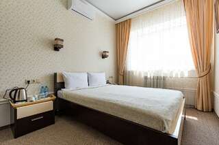 Гостиница Сибирский Сафари клуб Красноярск Стандартный двухместный номер с 1 кроватью или 2 отдельными кроватями-7